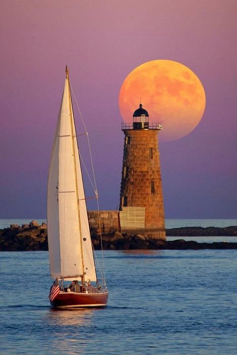 lightshouse moon boat water sunset